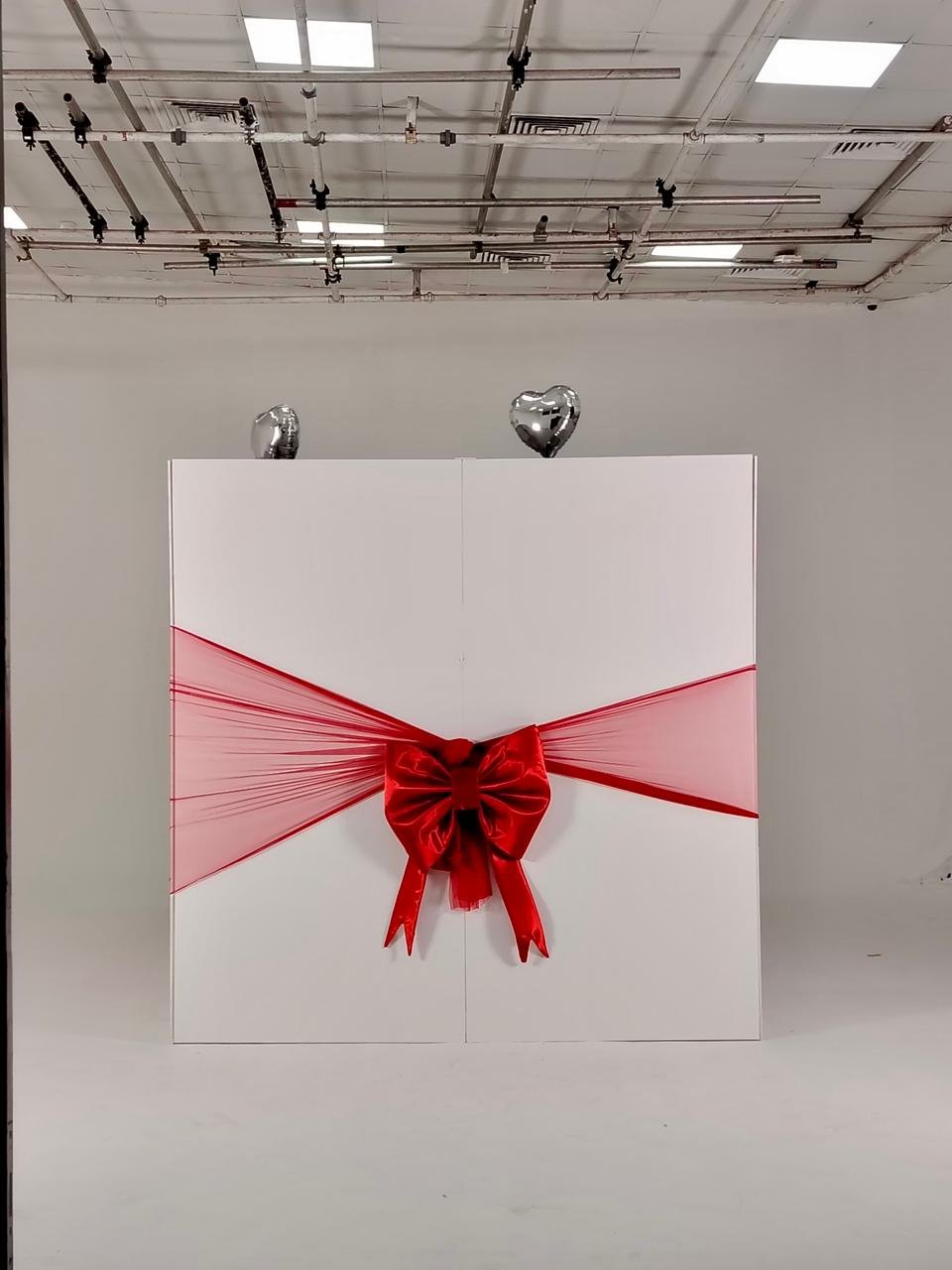 Large gift box with red ribbon,car gift box dubai, car unboxing dubai , car reveling dubai