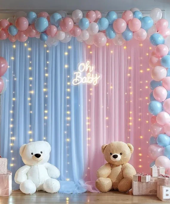 Welcome Baby balloon decoration with blue, pink, and white balloons, net cloth with lights, 2 small teddy bears (white and gray), 3 pink helium balloons, and Welcome Baby board in Dubai, UAE by Event Experts.