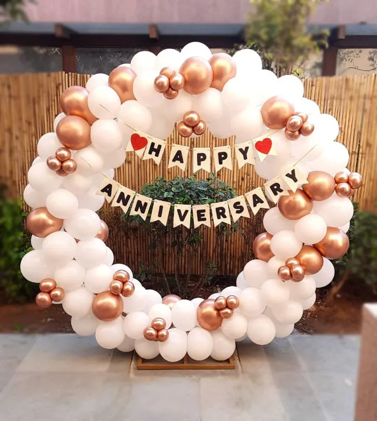 Aniversary round balloons arch setup