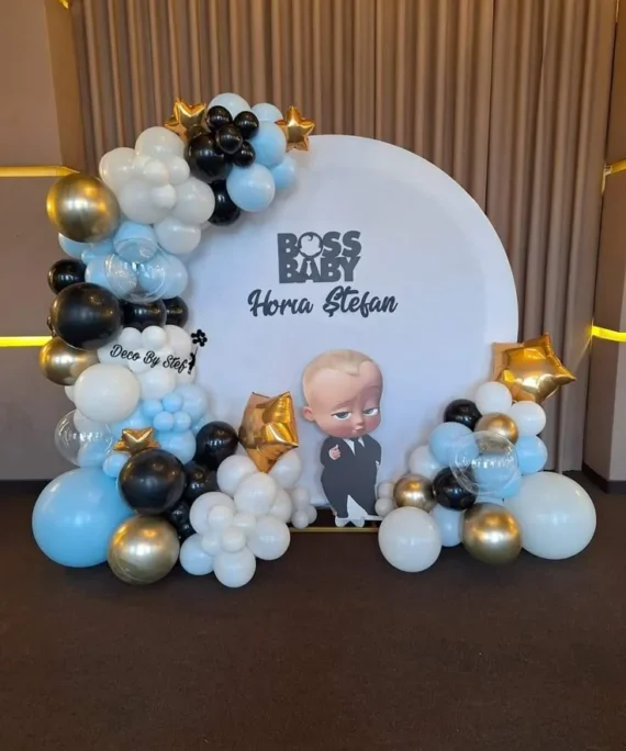 Baby Boss theme round arch backdrop balloon decoration with blue, black, white, rose gold balloons, transparent balloons, and rose gold foil star balloons for a luxury birthday celebration.